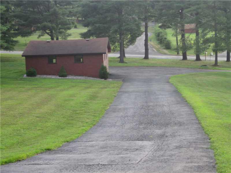 Exterior Front. Looking towards Red Cut Lodge Road