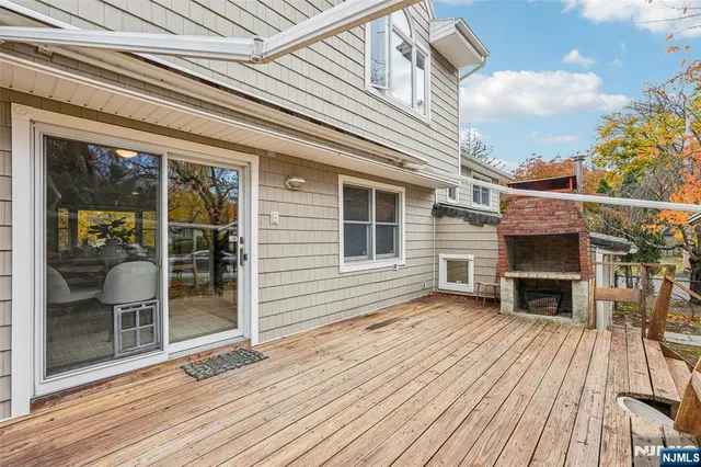 a view of a house with a roof deck