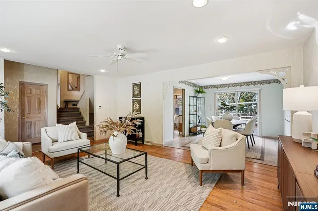 a living room with furniture and a table