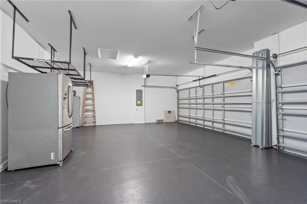 1779 Hagen Court Naples, FL 34120 - Photo 30 of 36 a view of a room with an empty space