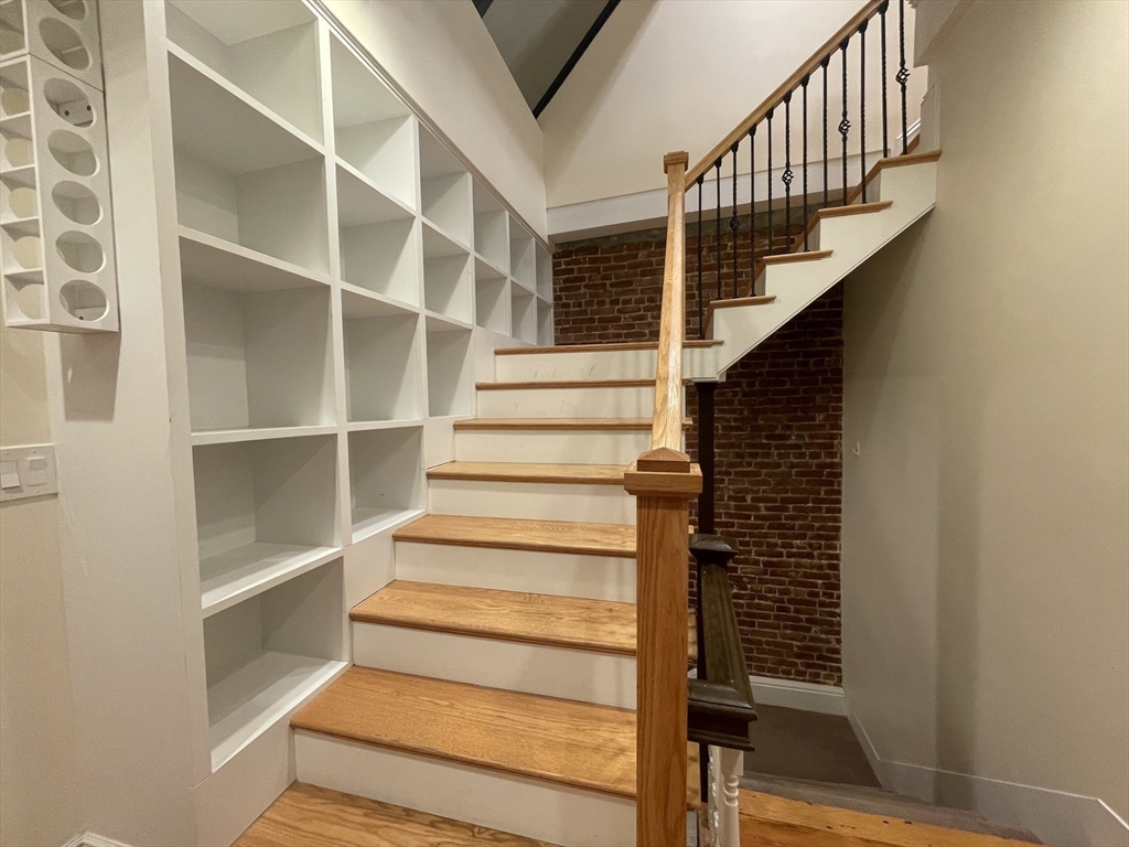1616 Beacon Street, Unit 3 Brookline, MA 02446 - Photo 16 of 17 a view of entryway with wooden floor and a front door