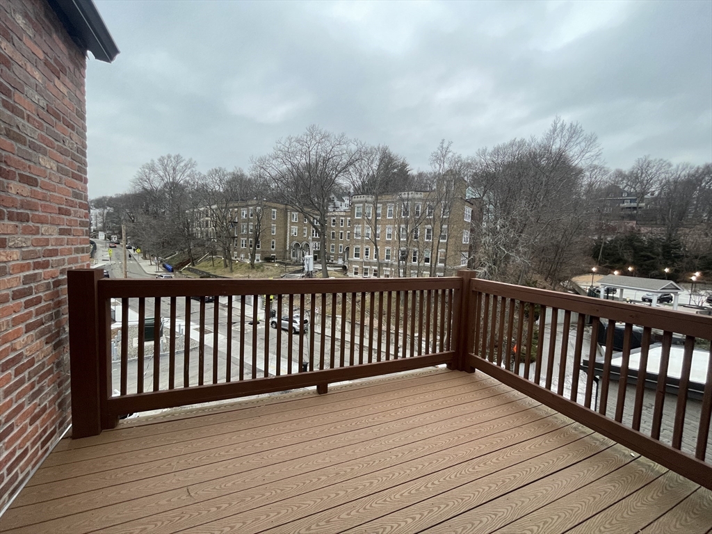 1616 Beacon Street, Unit 3 Brookline, MA 02446 - Photo 7 of 17 a view of city from a roof deck