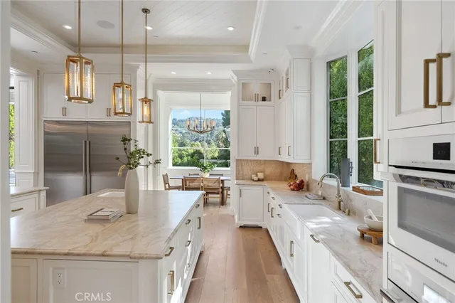 a bathroom with a shower and a sink