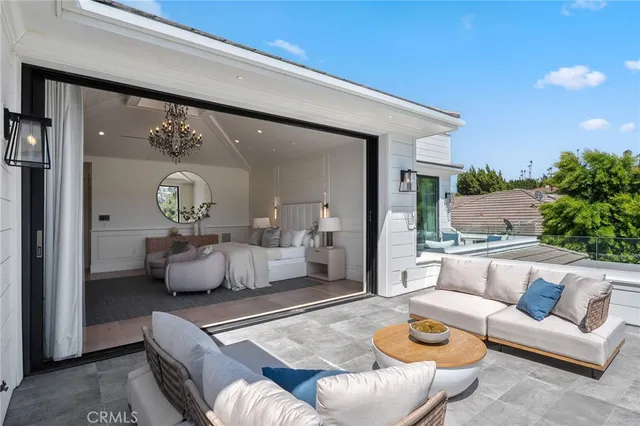 a bedroom with a bed and a table