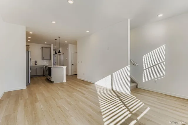 a bathroom with a shower and a sink