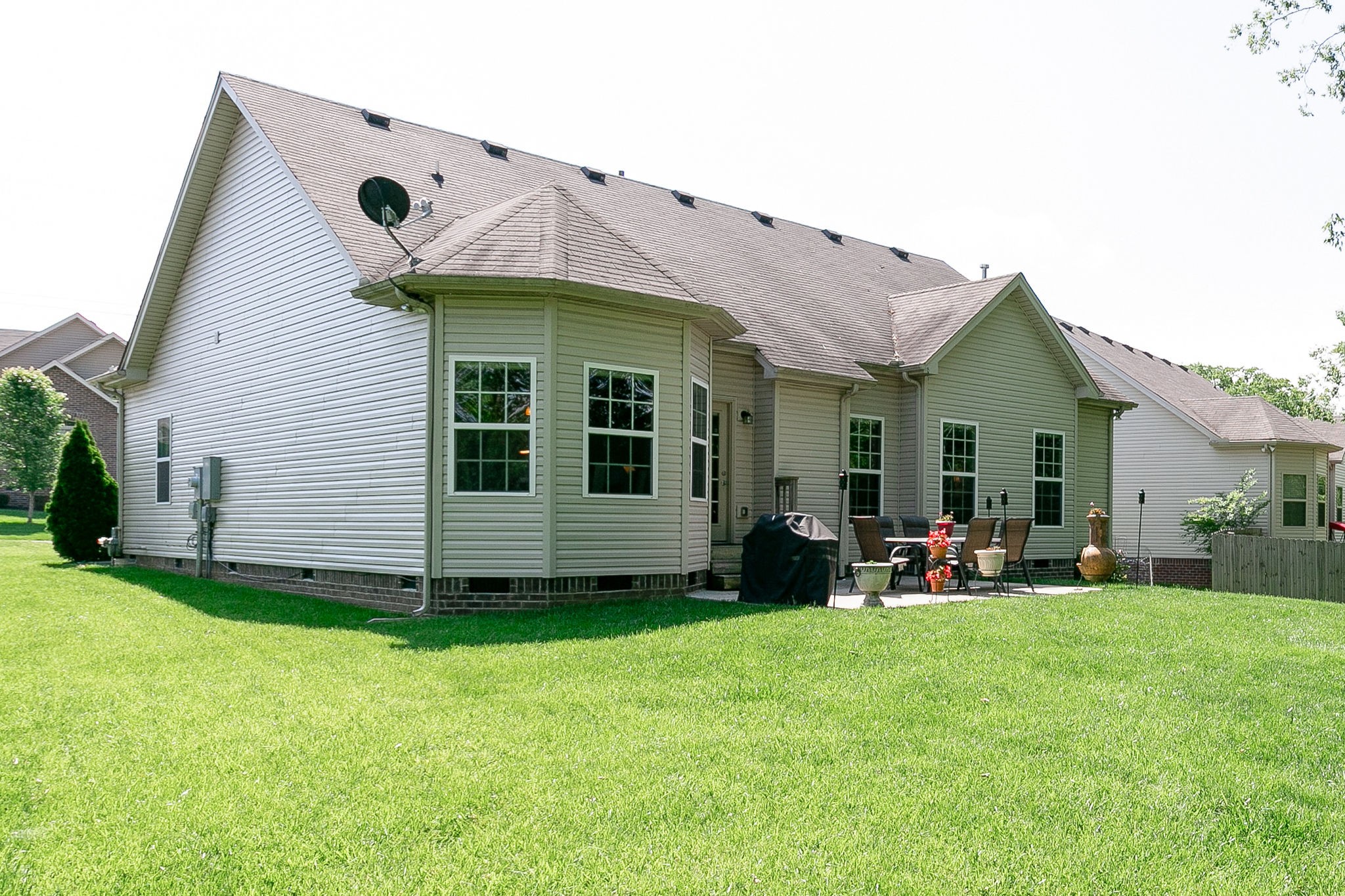 1104 Golf View Way Spring Hill, TN 37174 - Photo 29 of 31 a view of a house with a yard and sitting area