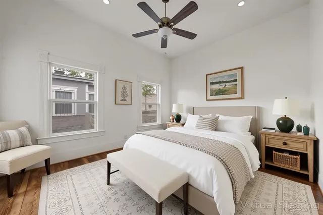 a bedroom with a bed and a couch