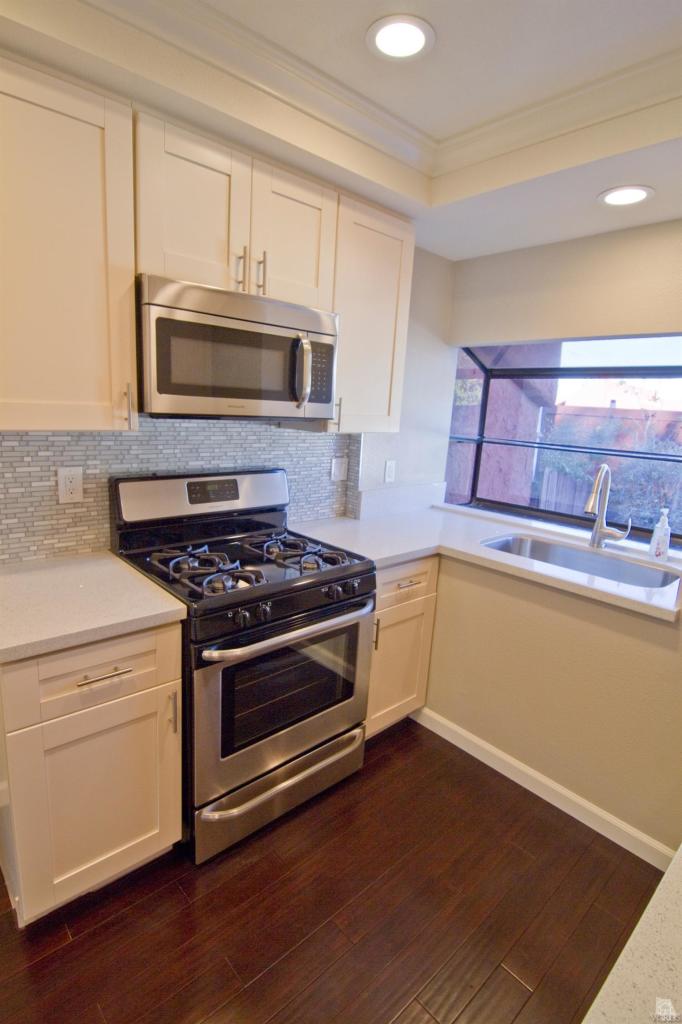 6408 Katherine Road, Unit A Simi Valley, CA 93063 - Photo 6 of 11 a kitchen with a stove and a microwave