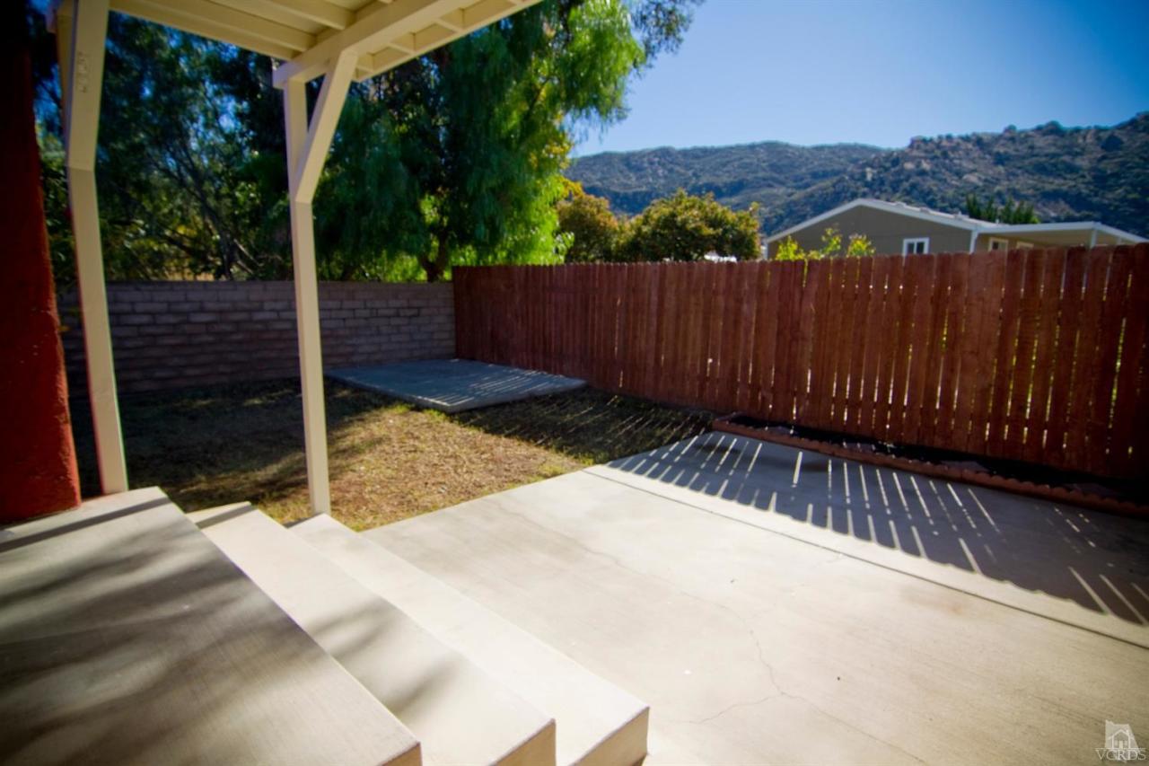 6408 Katherine Road, Unit A Simi Valley, CA 93063 - Photo 10 of 11 a view of a wooden fence