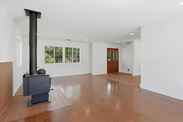 a view of an empty room with a window