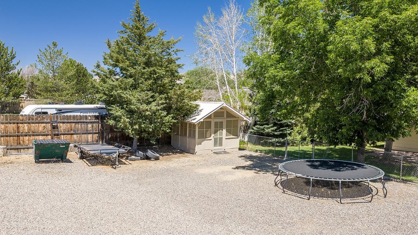 607-28 28 3/4 Road Grand Junction, CO 81506 - Photo 39 of 42 a view of a chair and table in backyard