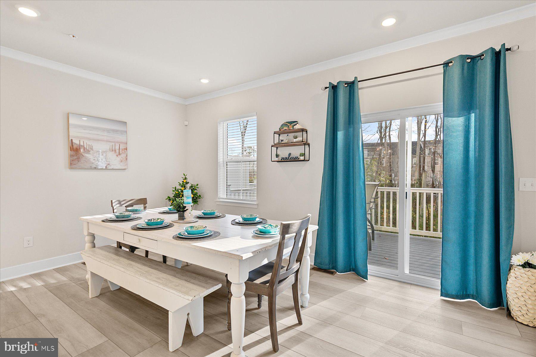9503 Seascape Lane, Unit 4 Berlin, MD 21811 - Photo 15 of 52 a dining room with furniture and window