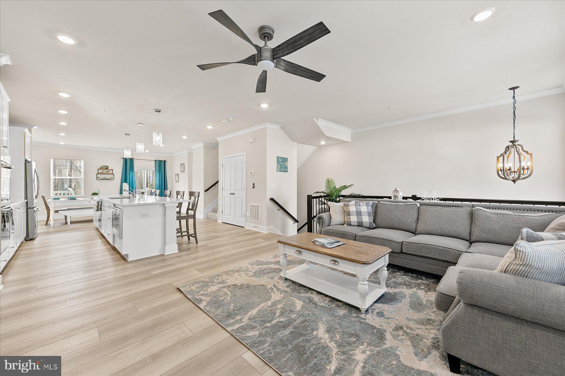 9503 Seascape Lane, Unit 4 Berlin, MD 21811 - Photo 5 of 52 a living room with furniture and kitchen view