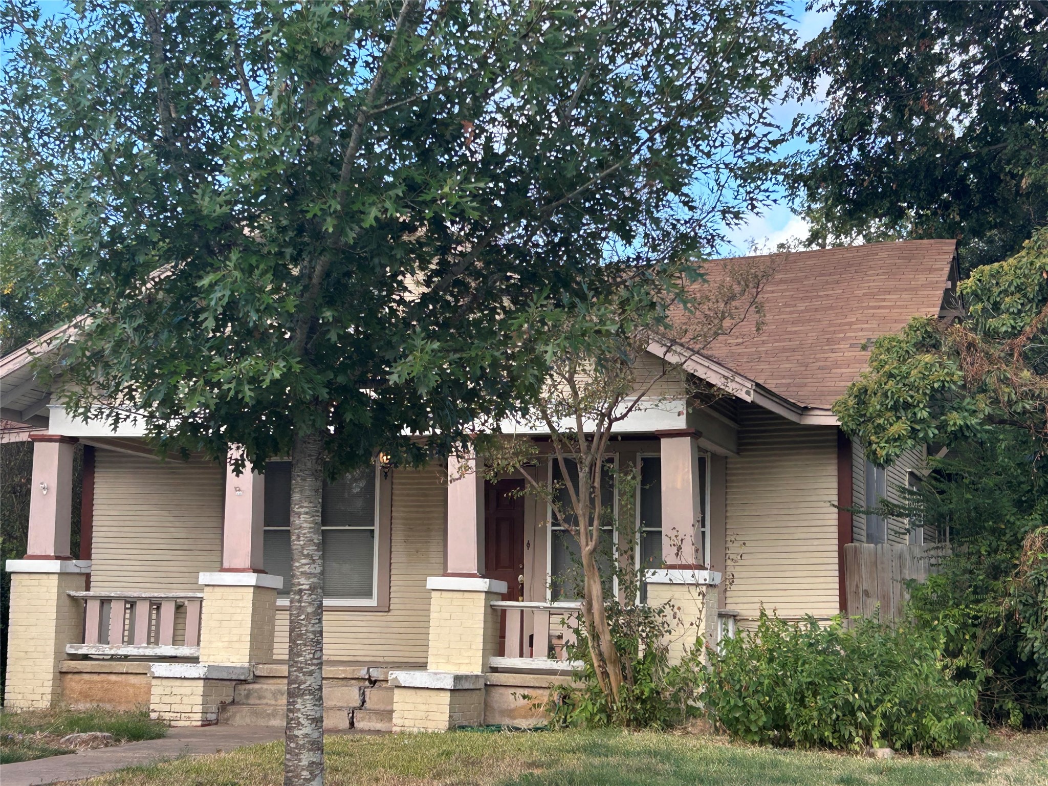413 Fowzer Street Taylor, TX 76574 - Photo 1 of 9 Covered porch with pressed tin ceiling