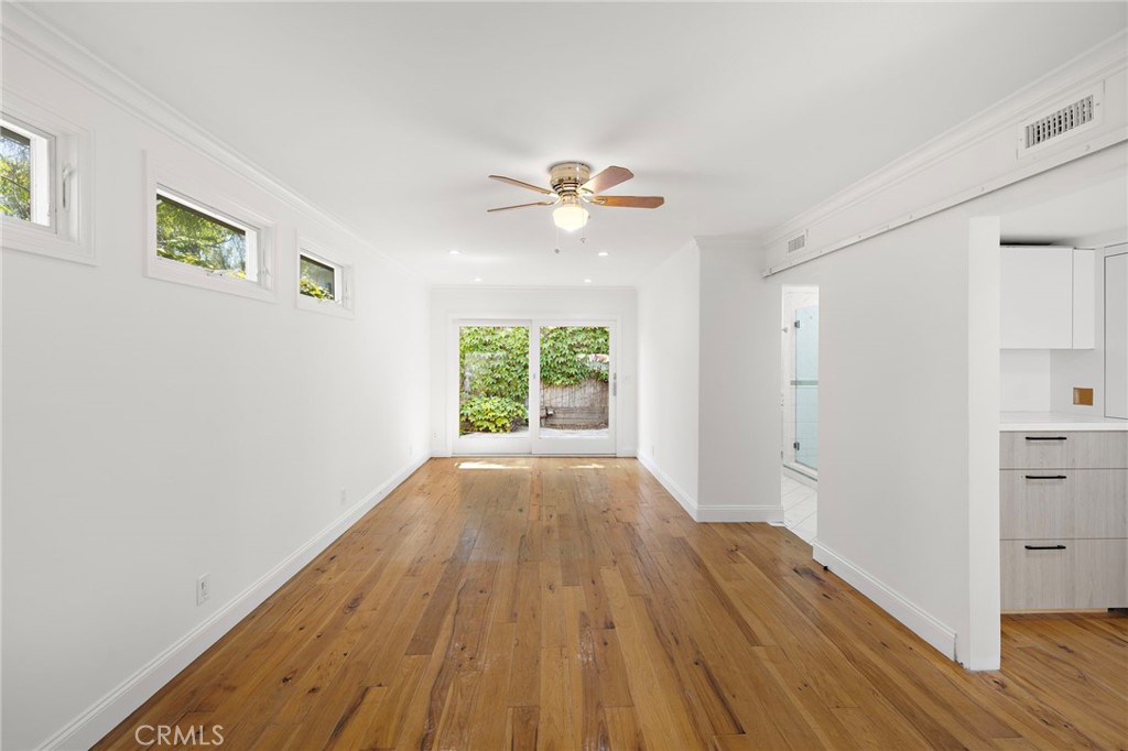 273 Cecil Place Costa Mesa, CA 92627 - Photo 11 of 18 wooden floor in an empty room with a window