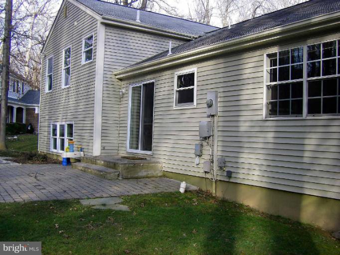 1844 Post Oak Trail Reston, VA 20191 - Photo 24 of 27 a view front of house with a yard