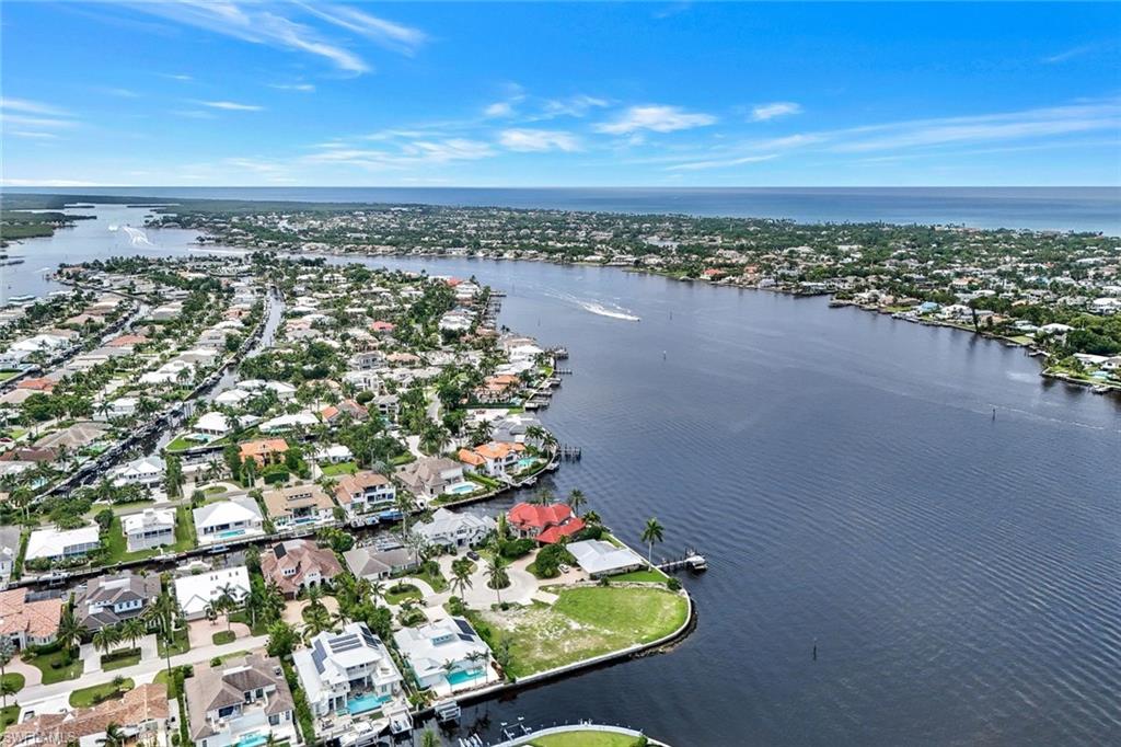 1303 Marlin Drive Naples, FL 34102 - Photo 9 of 15 Birds eye view of property featuring a water view