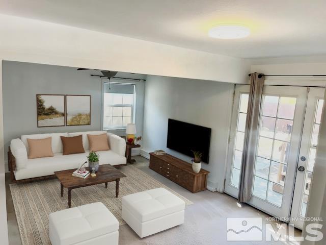 860 East Taylor Street Reno, NV 89502 - Photo 9 of 24 a living room with furniture and a flat screen tv
