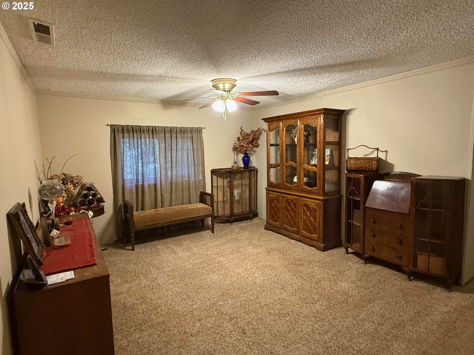 87511 Tiernan Road Mapleton, OR 97453 - Photo 12 of 23 a living room with furniture and a flat screen tv