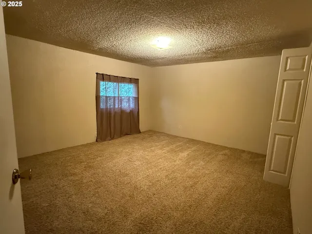 an empty room with a natural light