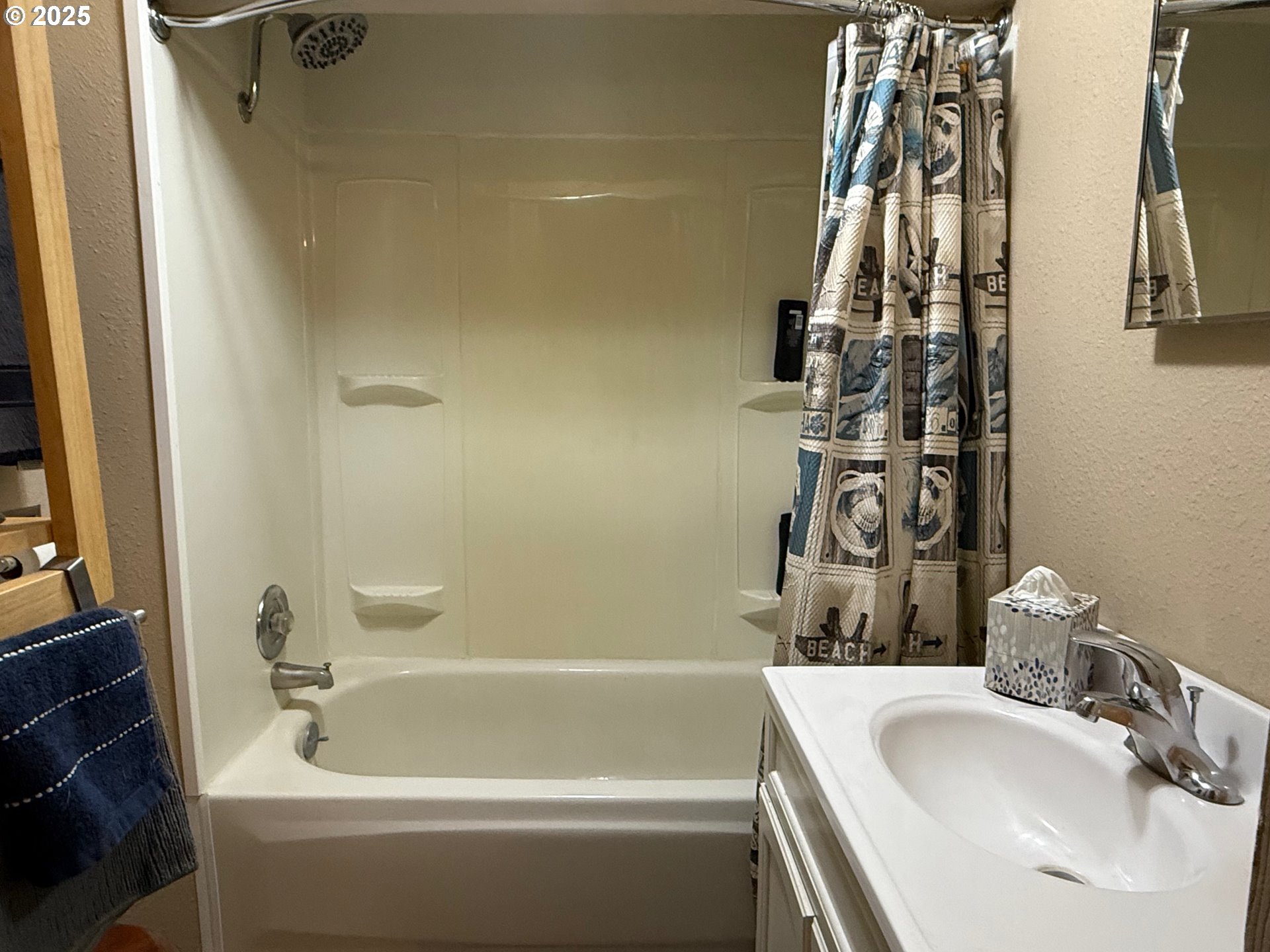 87511 Tiernan Road Mapleton, OR 97453 - Photo 14 of 23 a bathroom with a sink a bathtub and a shower