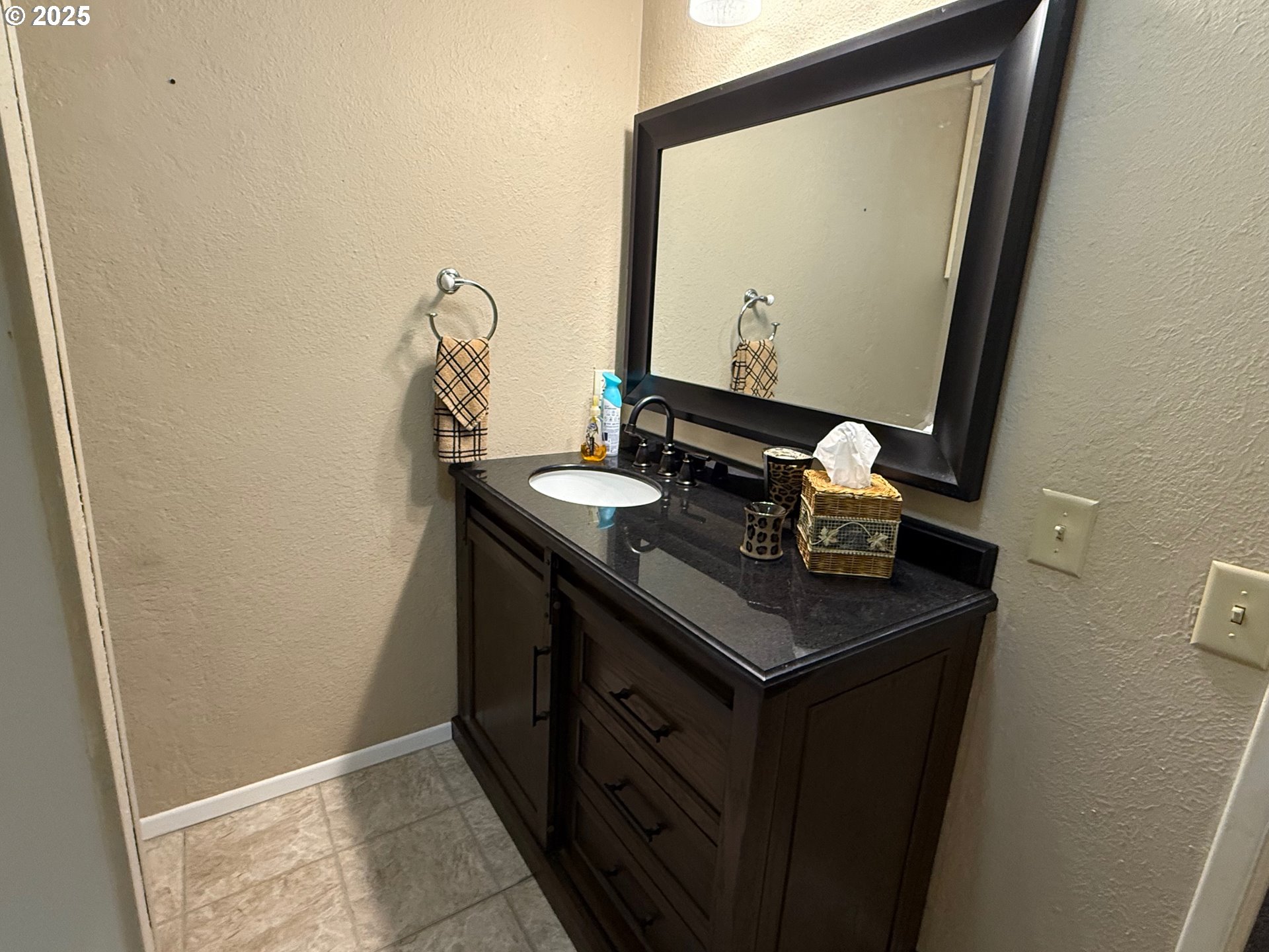 87511 Tiernan Road Mapleton, OR 97453 - Photo 18 of 23 a bathroom with a sink and a mirror