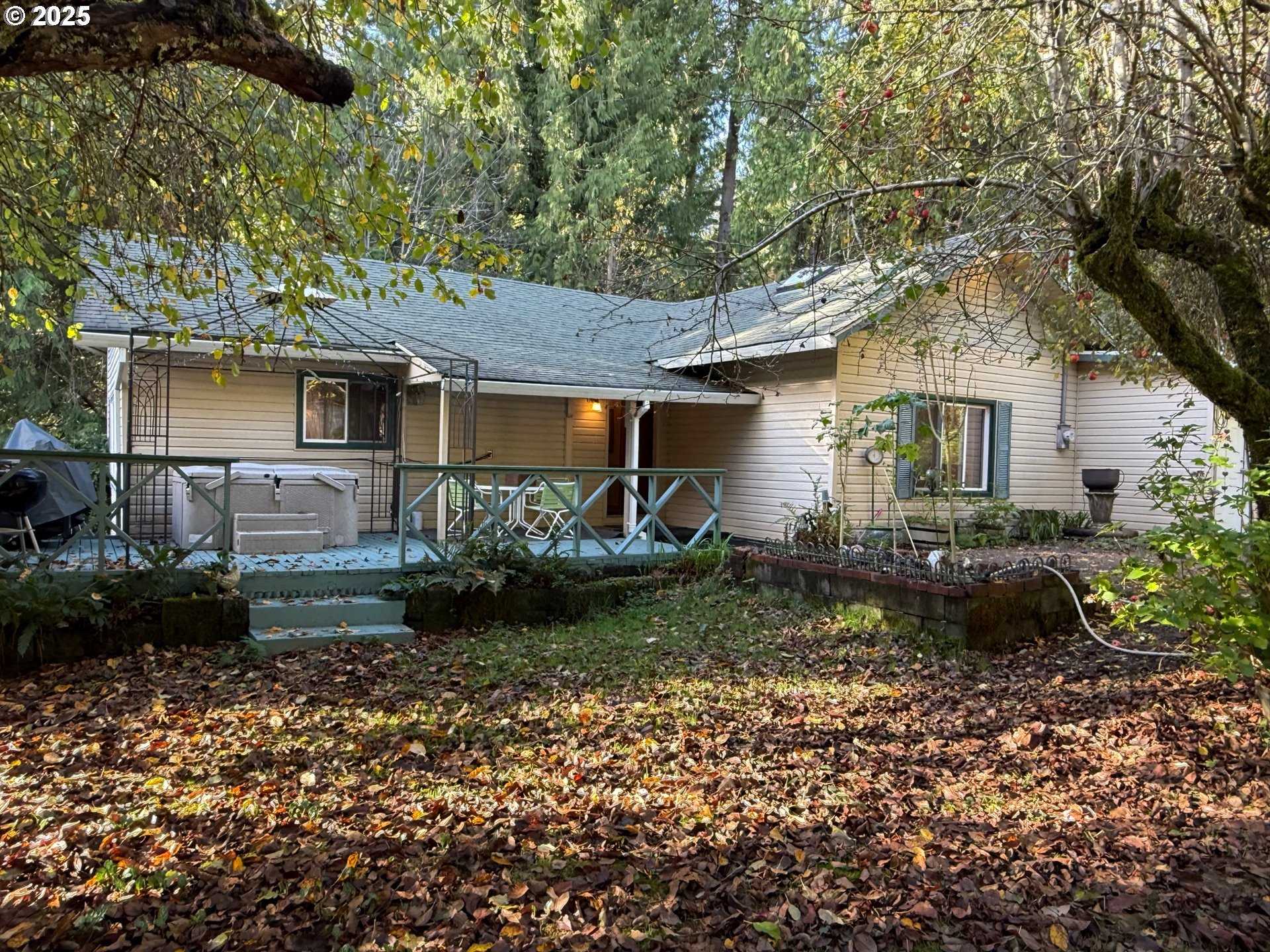 87511 Tiernan Road Mapleton, OR 97453 - Photo 2 of 23 a front view of a house with garden
