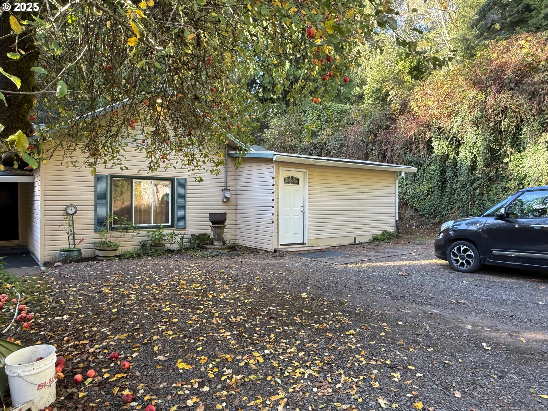 87511 Tiernan Road Mapleton, OR 97453 - Photo 23 of 23 a view of a car parked in front of a house