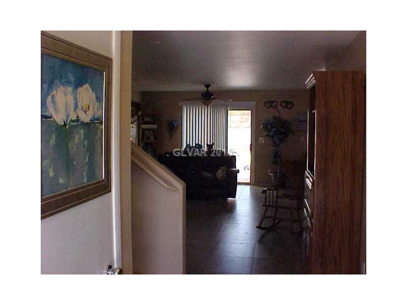 1156 Paradise Home Road Henderson, NV 89002 - Photo 5 of 31 Property Photo. FOYER INTO THE GREATROOM. 18" TILE, 2 TONE PAINT. VERY NICE!