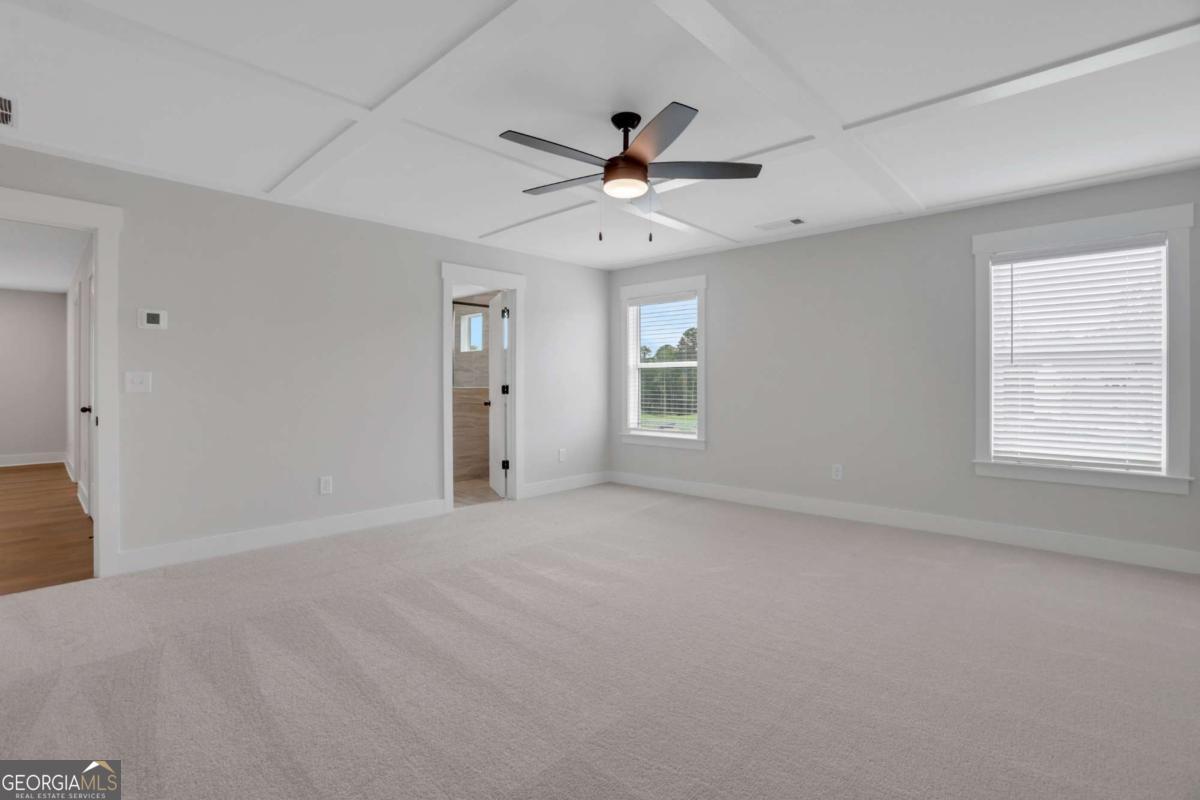 4230 Mary Ruth Way Loganville, GA 30052 - Photo 29 of 51 a view of an empty room with a window