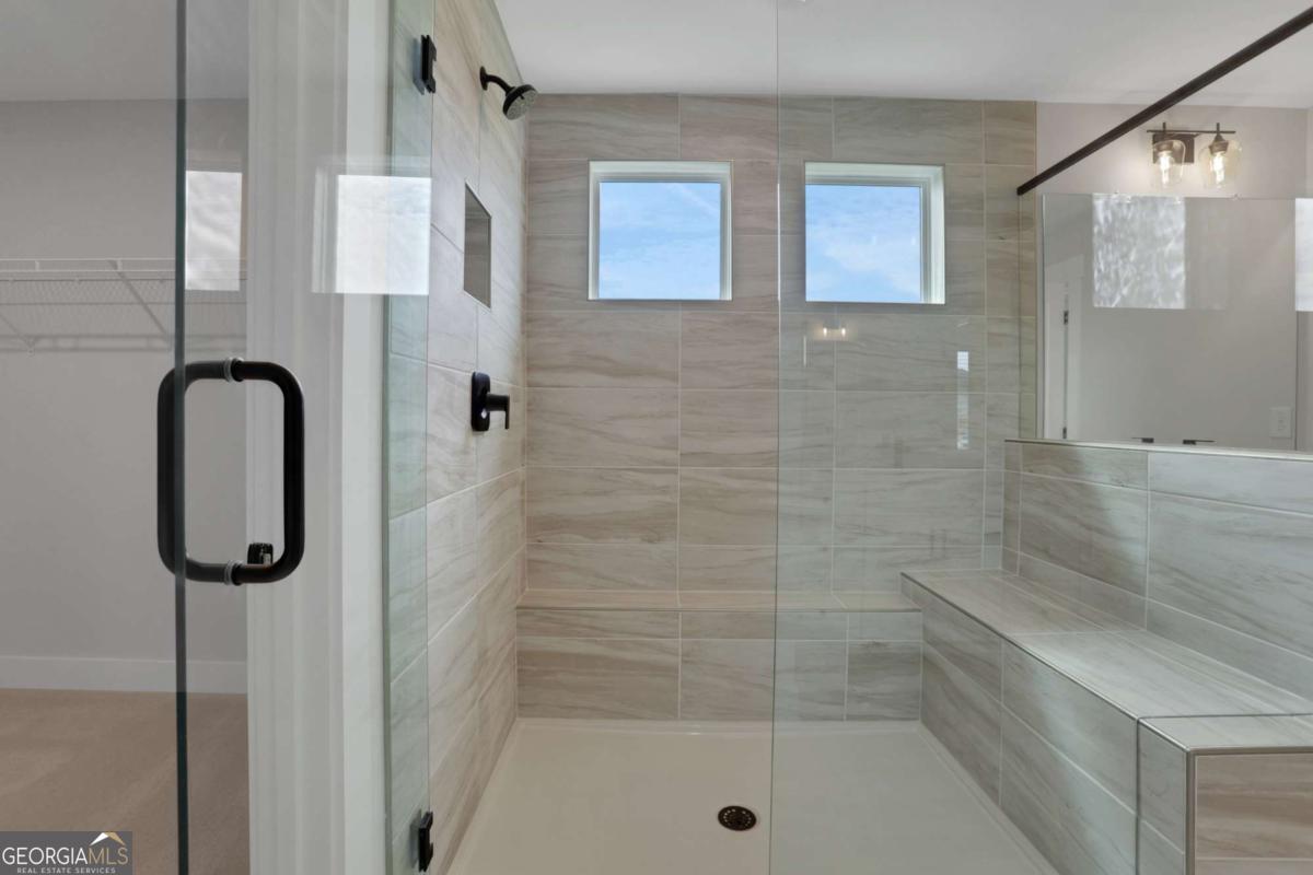 4230 Mary Ruth Way Loganville, GA 30052 - Photo 35 of 51 a bathroom with a shower