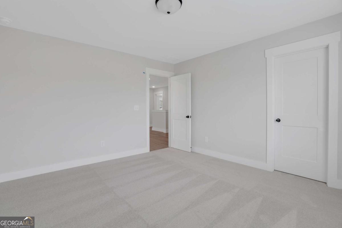 4230 Mary Ruth Way Loganville, GA 30052 - Photo 38 of 51 a view of an empty room