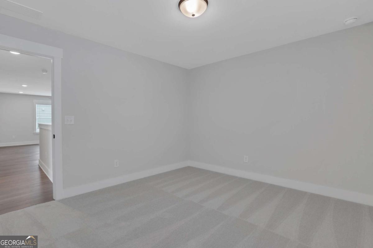 4230 Mary Ruth Way Loganville, GA 30052 - Photo 40 of 51 a view of an empty room