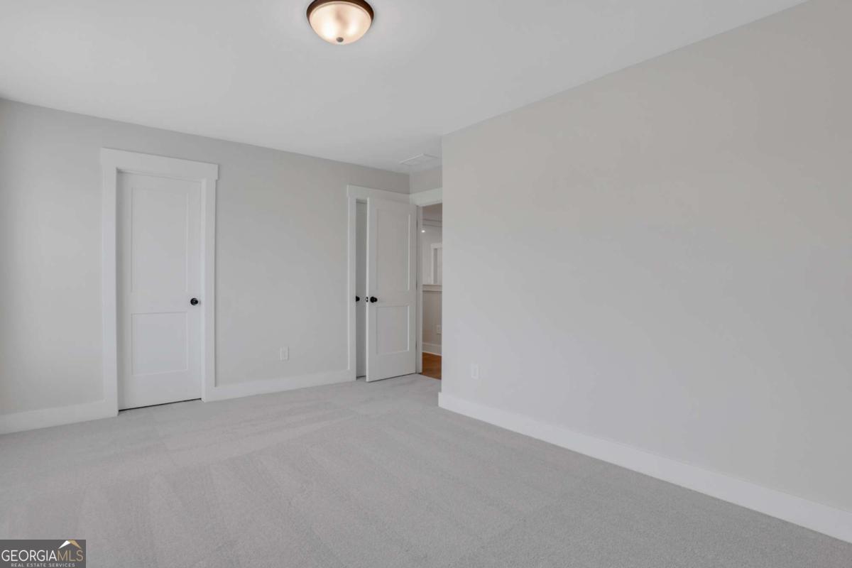 4230 Mary Ruth Way Loganville, GA 30052 - Photo 42 of 51 a view of an empty room