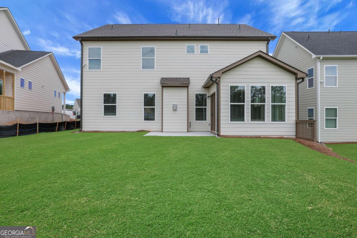 4230 Mary Ruth Way Loganville, GA 30052 - Photo 50 of 51 a view of a house with a yard