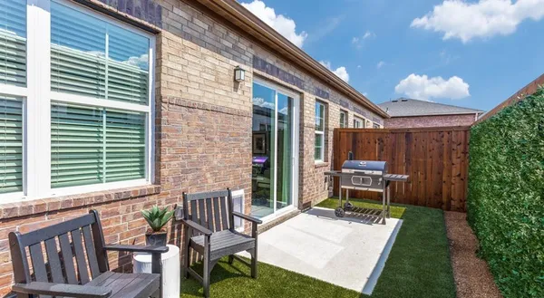 a view of a backyard with plants