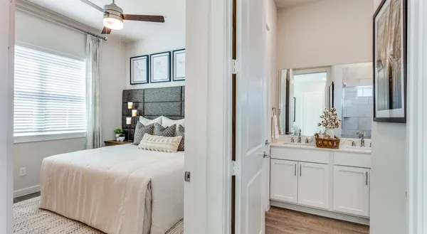 a kitchen with stainless steel appliances granite countertop a sink a stove and a microwave