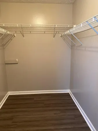 a view of an empty walk in closet