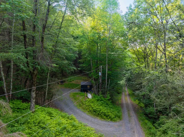 a view of a backyard with garden