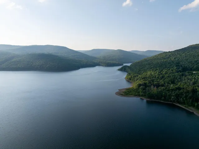a view of lake and mountain