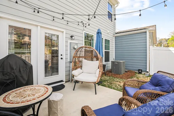 a view of a livingroom with furniture and a table