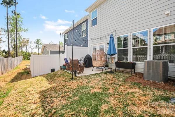 a backyard of a house with seating space