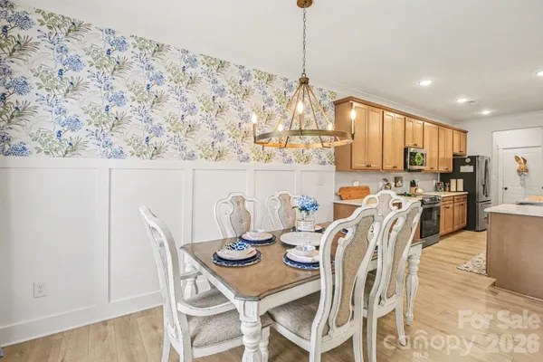a view of a dining room with furniture