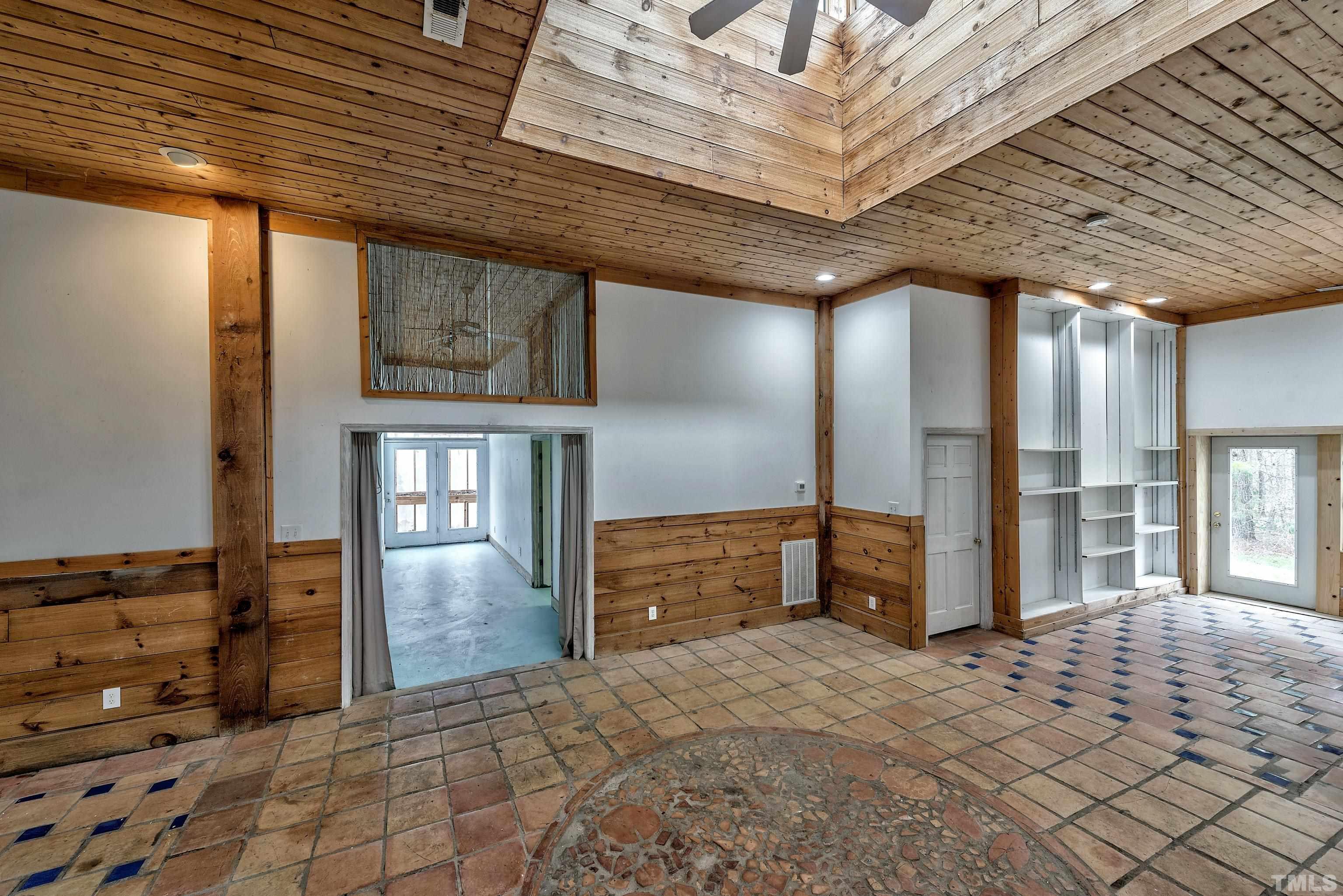7409 Wiley Mangum Road Bahama, NC 27503 - Photo 13 of 20 a spacious bathroom with a large mirror
