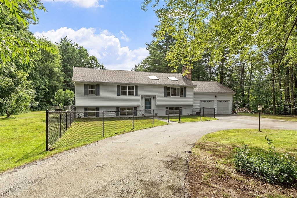 152 Wheeler Road Ashby, MA 01431 - Photo 40 of 41 a view of a house with pool and a yard
