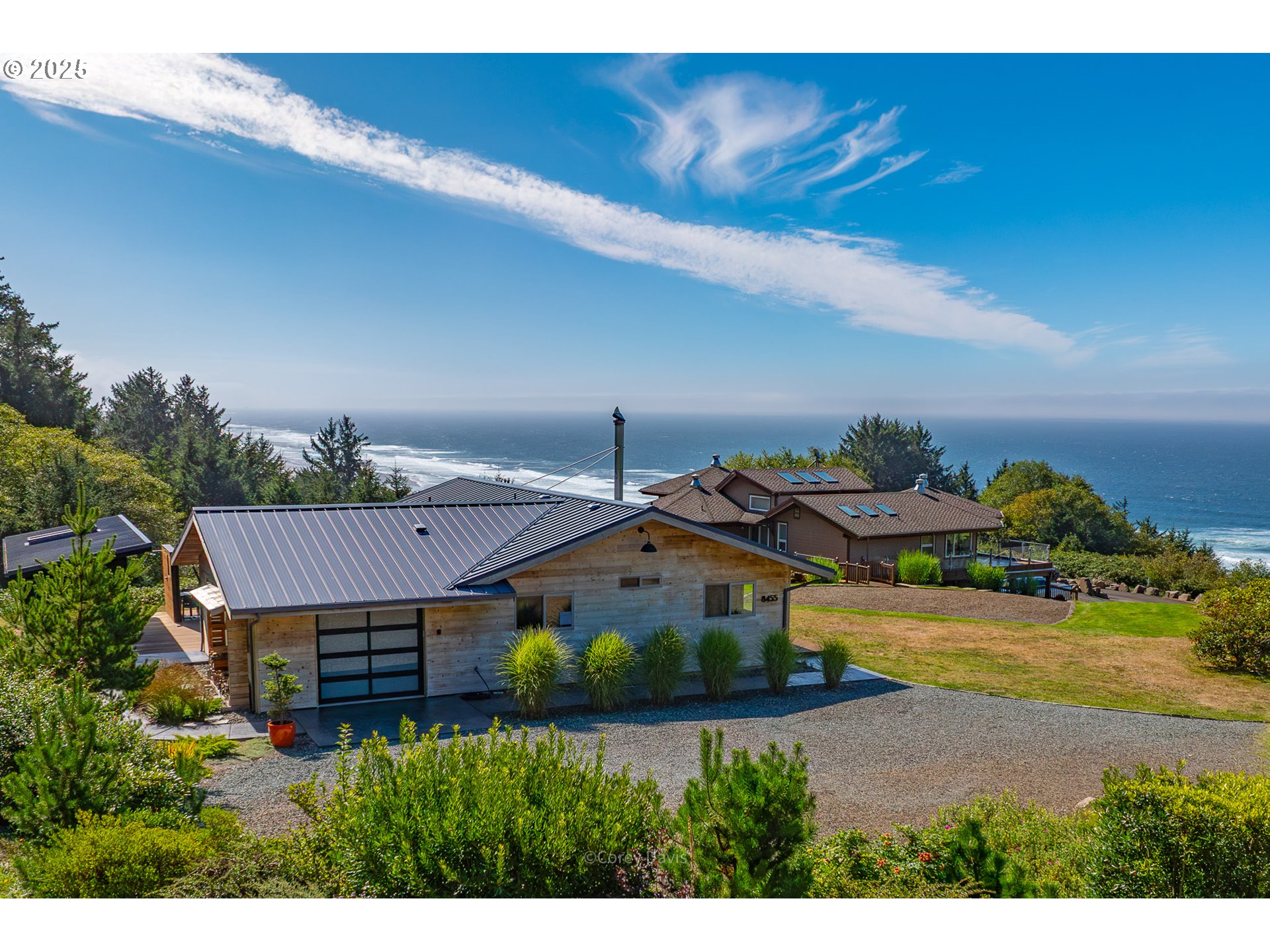 8455 San Dune Road Nehalem, OR 97131 - Photo 1 of 48 a view of house with outdoor space and a car park