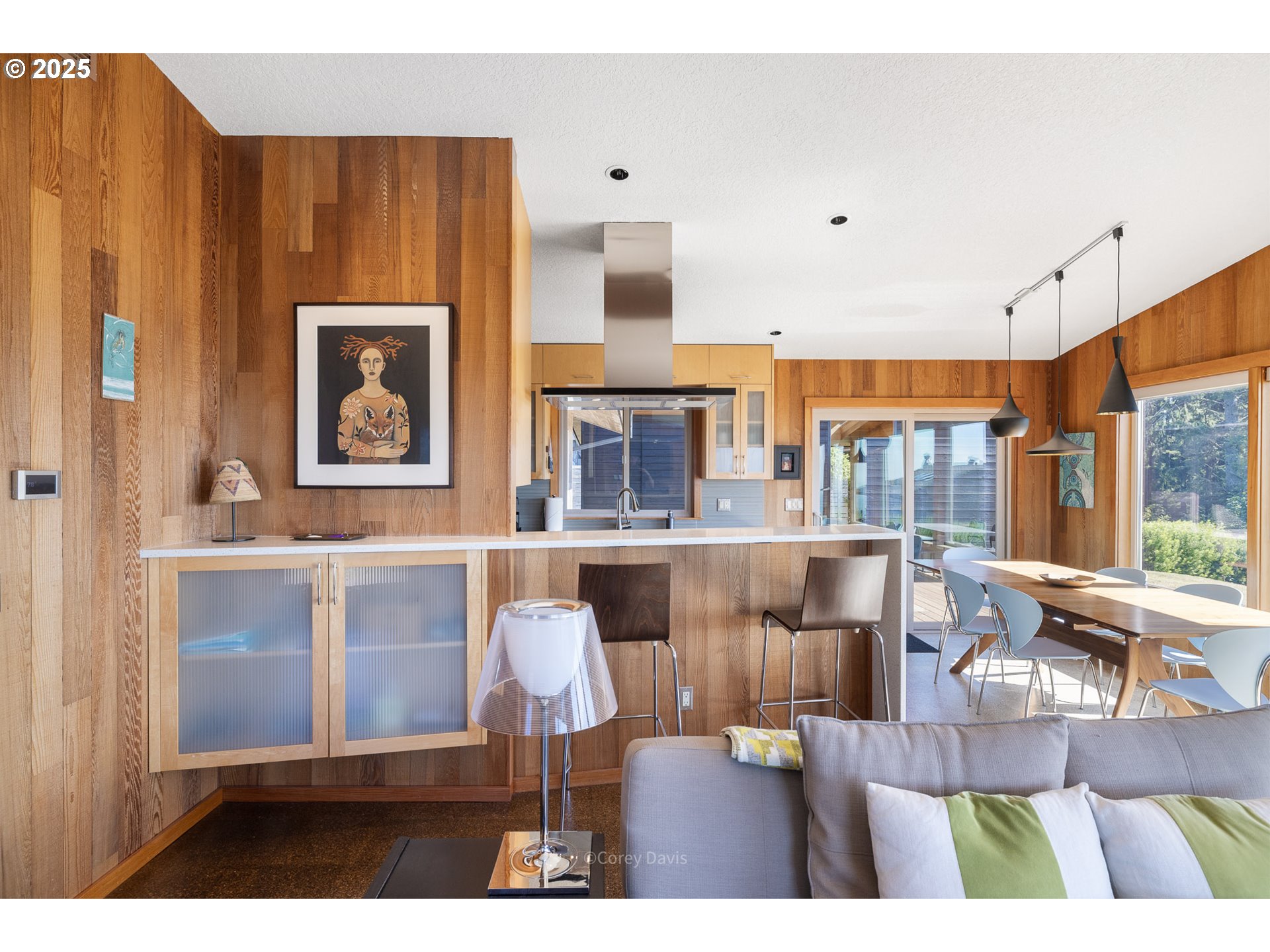 8455 San Dune Road Nehalem, OR 97131 - Photo 14 of 48 a living room with furniture and a fireplace