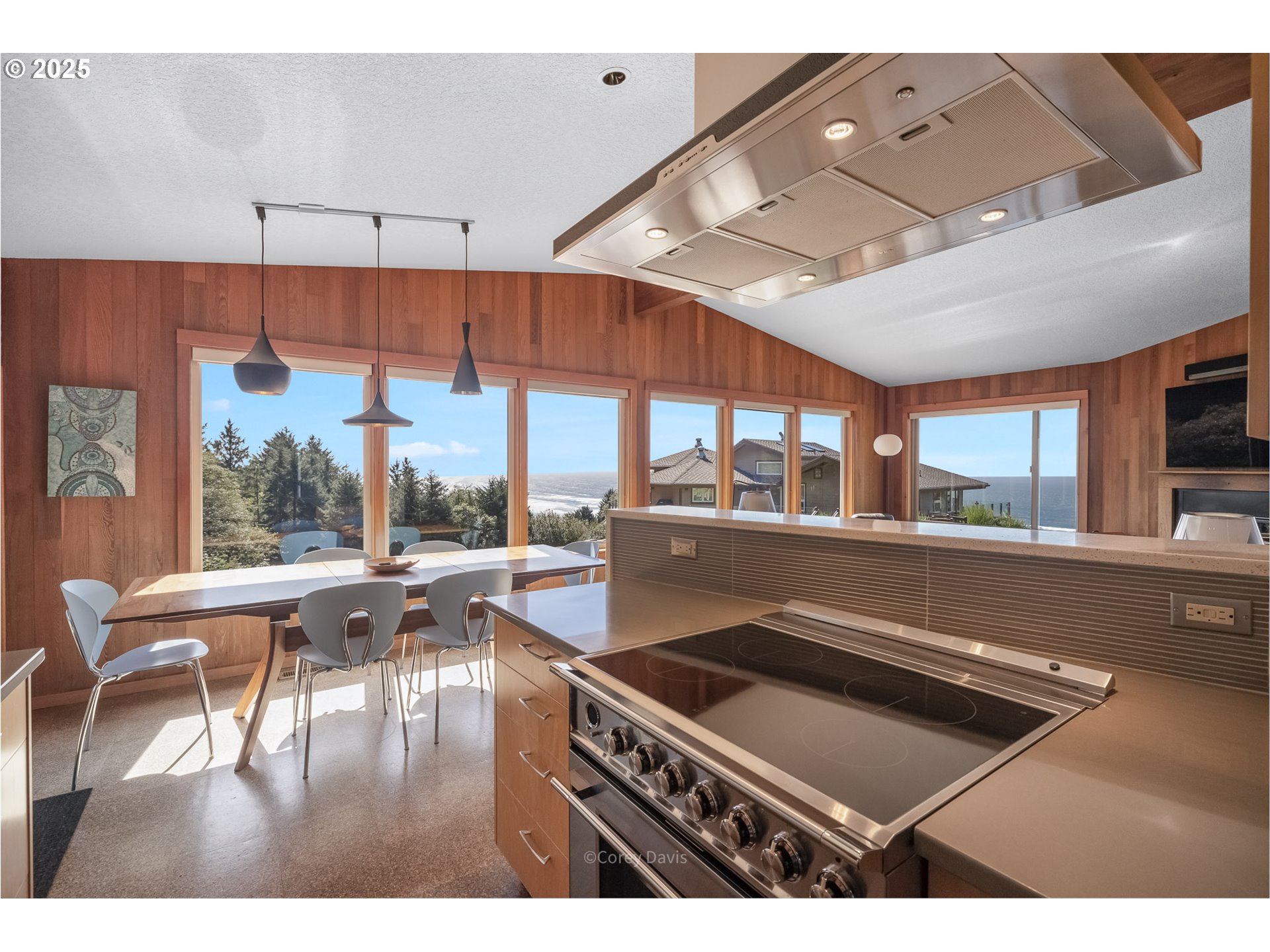 8455 San Dune Road Nehalem, OR 97131 - Photo 17 of 48 a living room with a large window