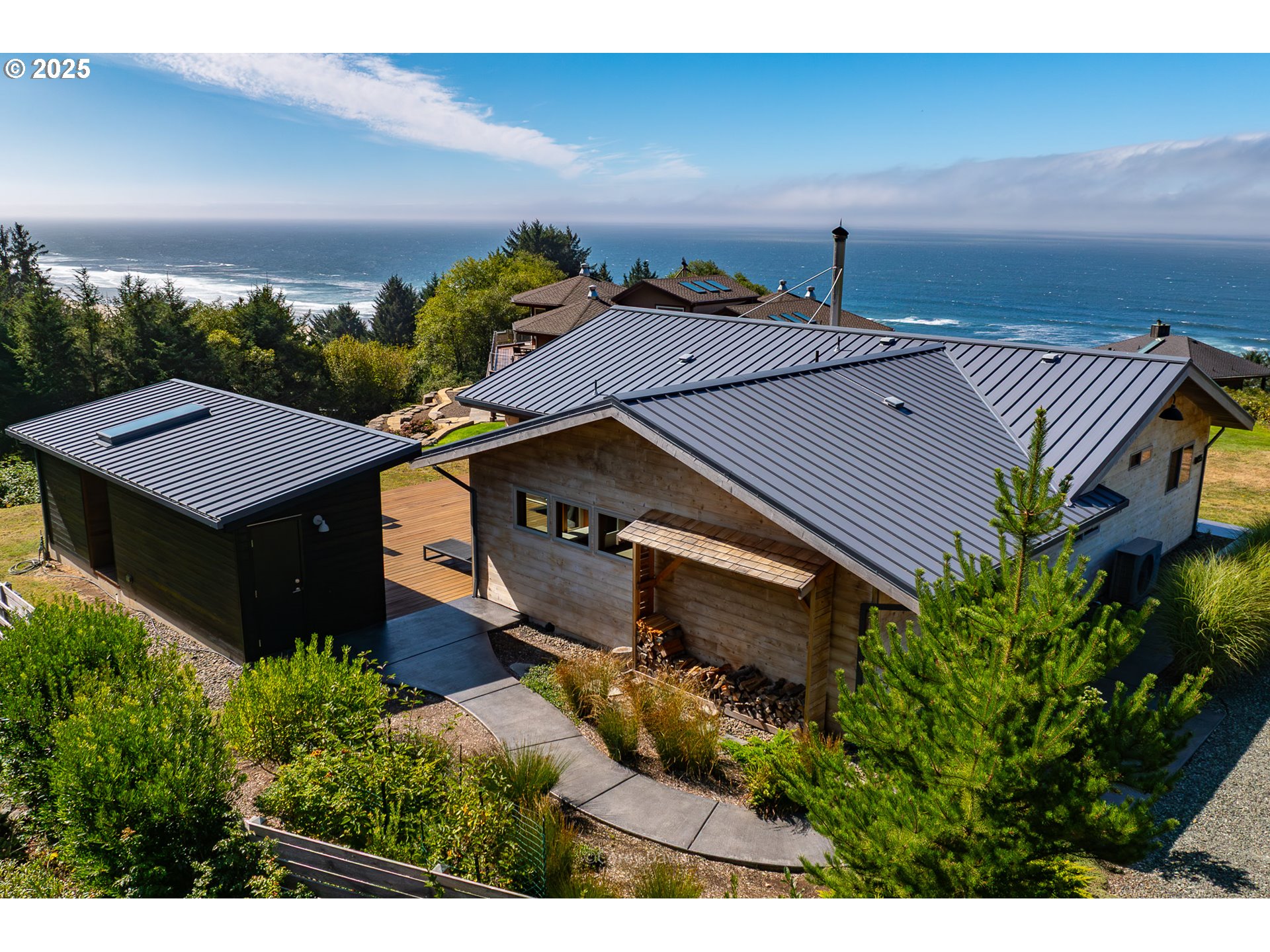8455 San Dune Road Nehalem, OR 97131 - Photo 38 of 48 an aerial view of a house with a yard