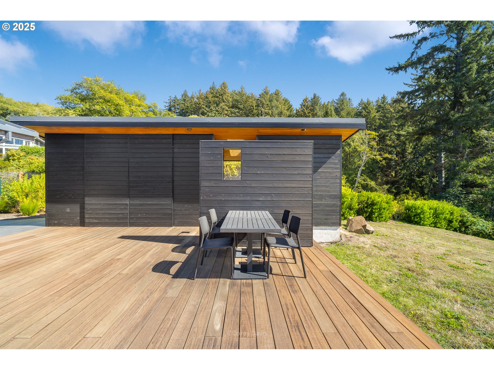 8455 San Dune Road Nehalem, OR 97131 - Photo 47 of 48 a view of a patio with wooden floor
